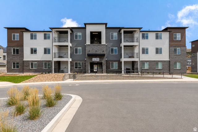 4695 South 690th West, Unit U201 Mapleton, UT 84664 - Photo 1 of 16 Contemporary multi-story facade featuring varied siding and stone accents