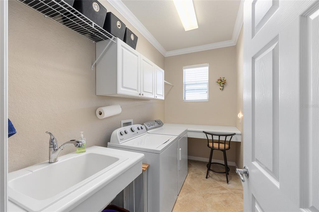 9823 Southwest 72nd Lane Ocala, FL 34481 - Photo 25 of 46 a utility room with dryer and washer