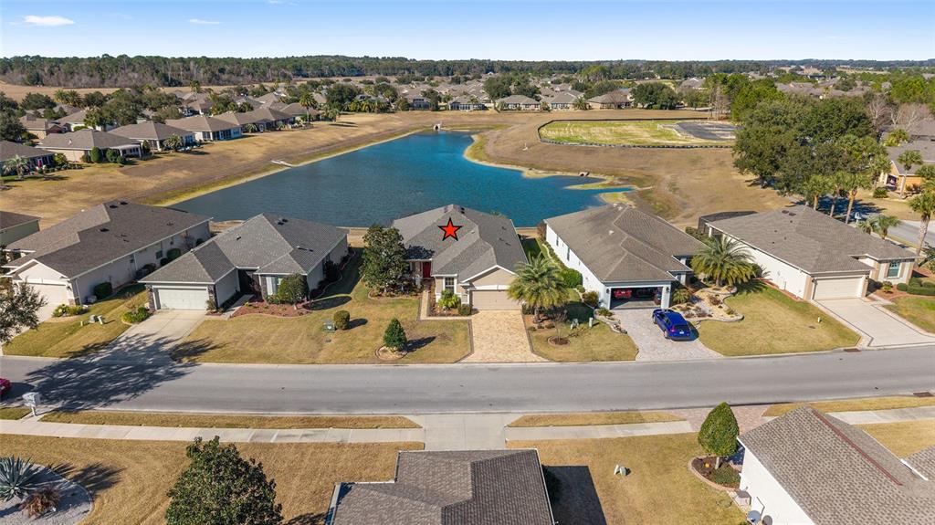 9823 Southwest 72nd Lane Ocala, FL 34481 - Photo 31 of 46 an aerial view of a house with a ocean view