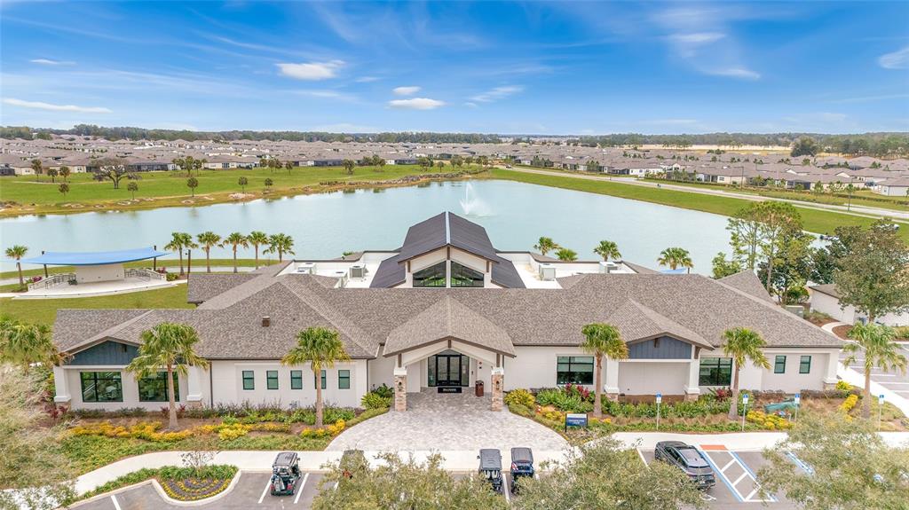 9823 Southwest 72nd Lane Ocala, FL 34481 - Photo 41 of 46 an aerial view of residential houses with outdoor space and ocean view