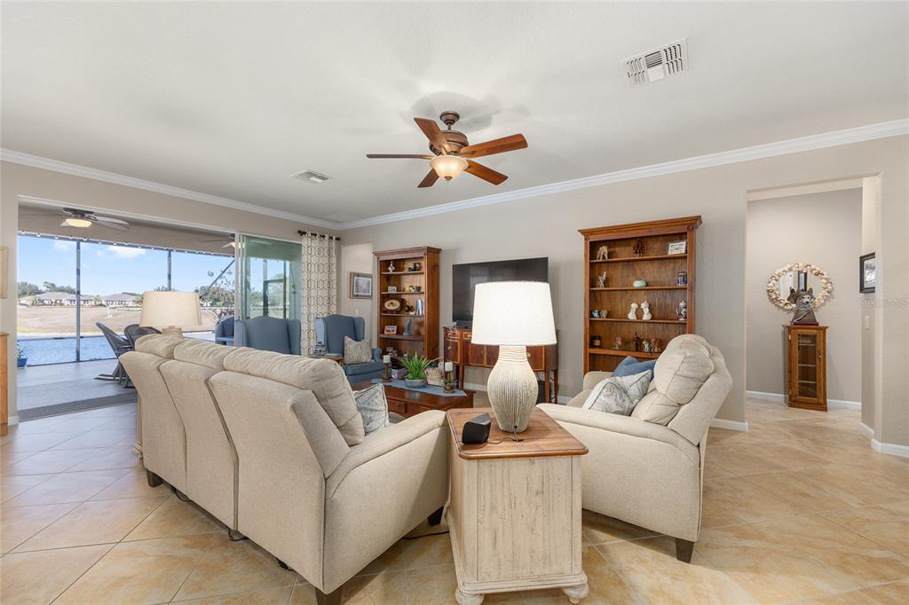 9823 Southwest 72nd Lane Ocala, FL 34481 - Photo 5 of 46 a living room with furniture