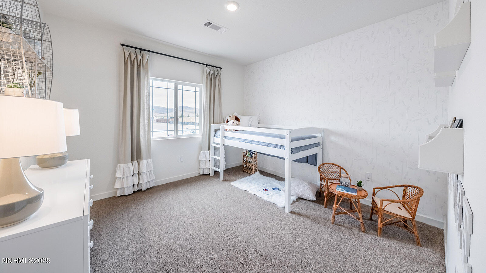 4552 Mifflin Street, Unit LOT #9 Fernley, NV 89408 - Photo 8 of 11 a room with a chair and white walls