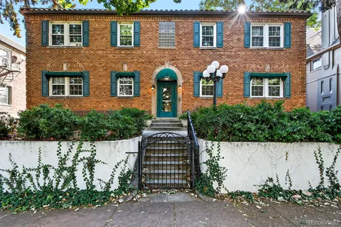 a front view of a house having yard