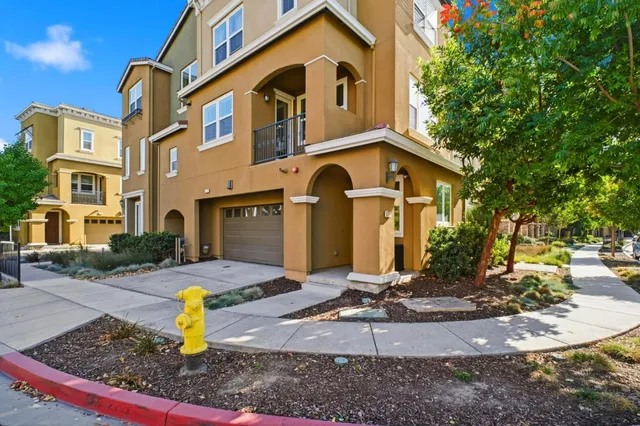 a view of a building with sitting area
