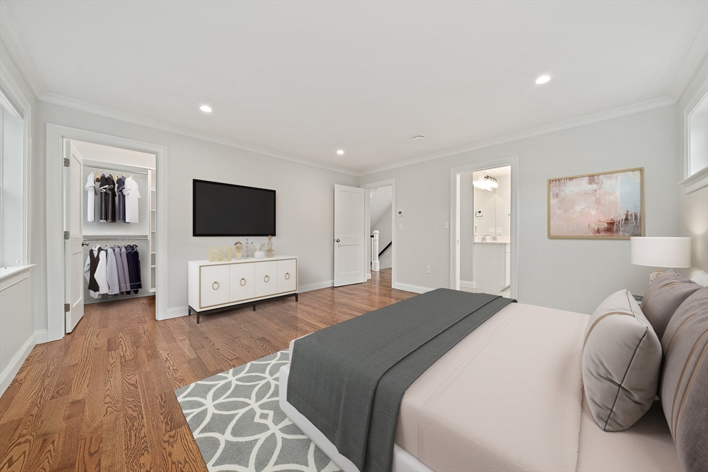 15 Lakeview Avenue Waltham, MA 02451 - Photo 16 of 34 a bedroom with a bed and a flat tv screen