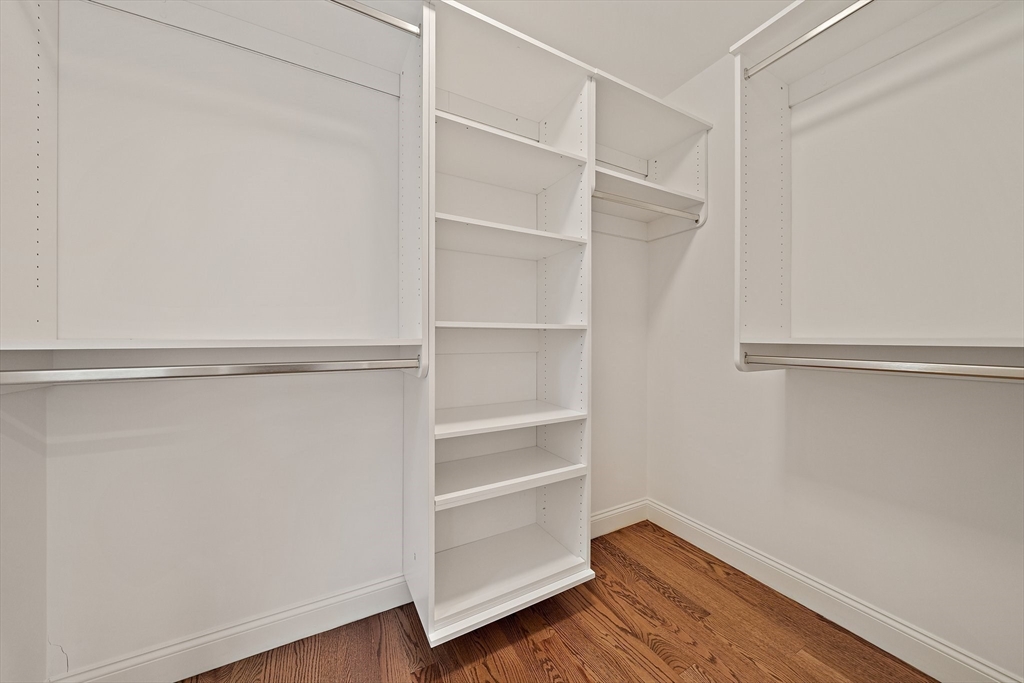 15 Lakeview Avenue Waltham, MA 02451 - Photo 19 of 34 a view of walk in closet with empty racks