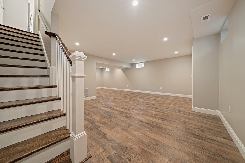 15 Lakeview Avenue Waltham, MA 02451 - Photo 30 of 34 a view of entryway with wooden floor