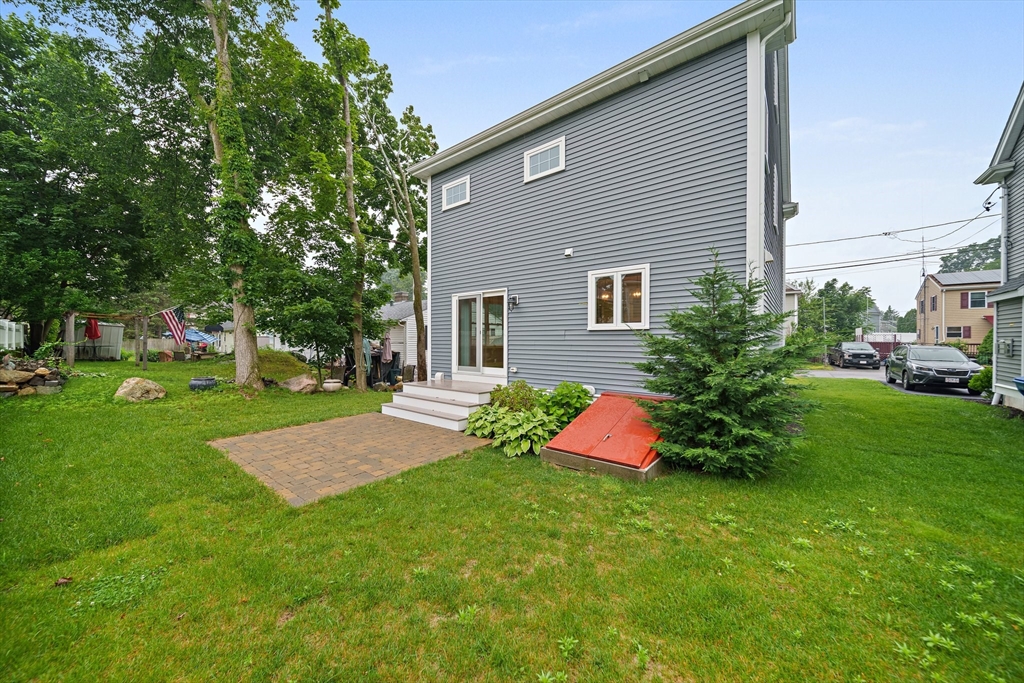 15 Lakeview Avenue Waltham, MA 02451 - Photo 34 of 34 a front view of house with yard and green space