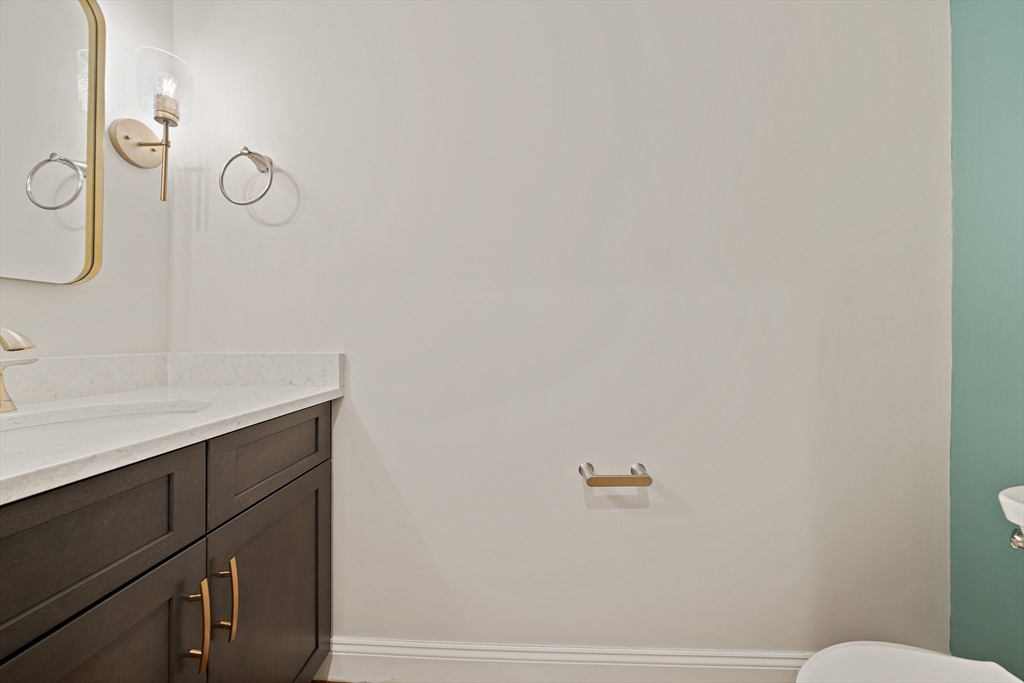 15 Lakeview Avenue Waltham, MA 02451 - Photo 5 of 34 a bathroom with a shower and vanity