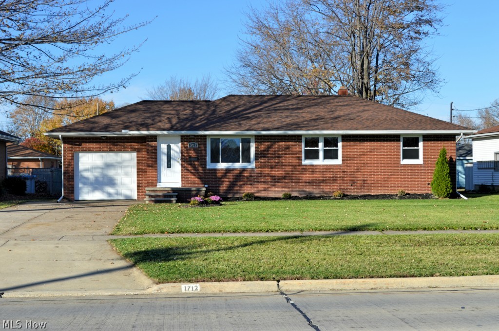 1712 Meister Road Lorain, OH 44053 - Photo 2 of 17 Street view at sunset - faces south.