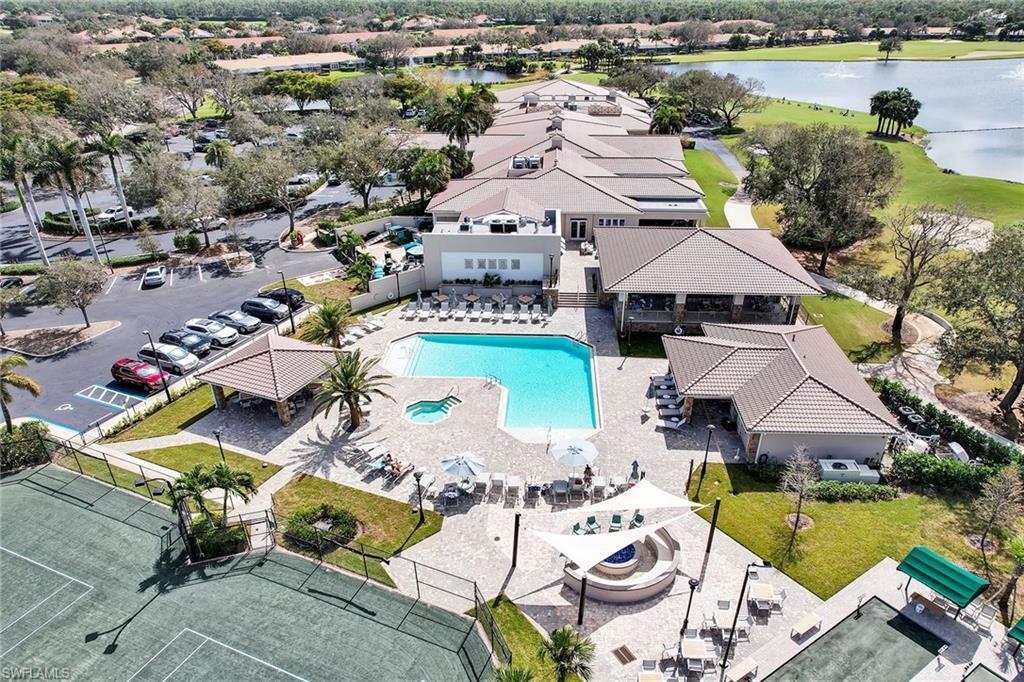 9189 Spring Run Boulevard, Unit 1908 Estero, FL 34135 - Photo 21 of 33 an aerial view of a house with swimming pool and outdoor seating