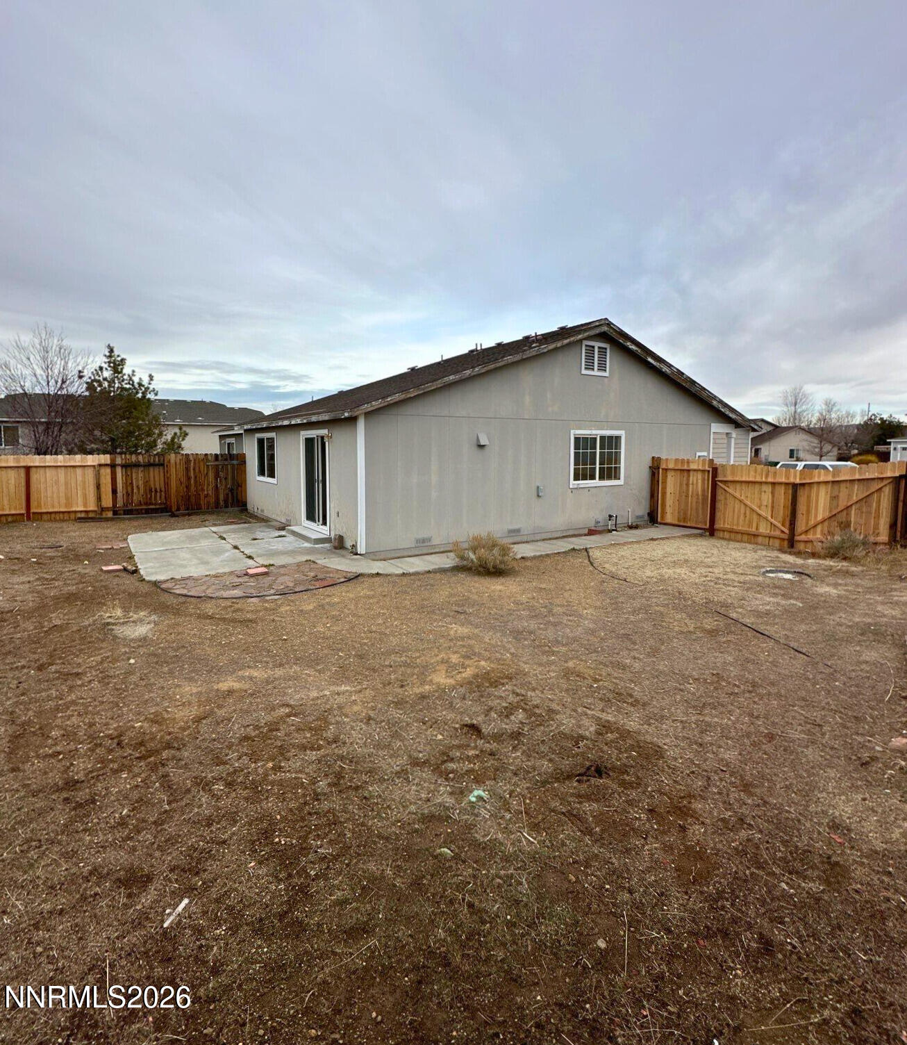 8675 Crimson Sky Court Reno, NV 89506 - Photo 16 of 16 a big room with table and chairs