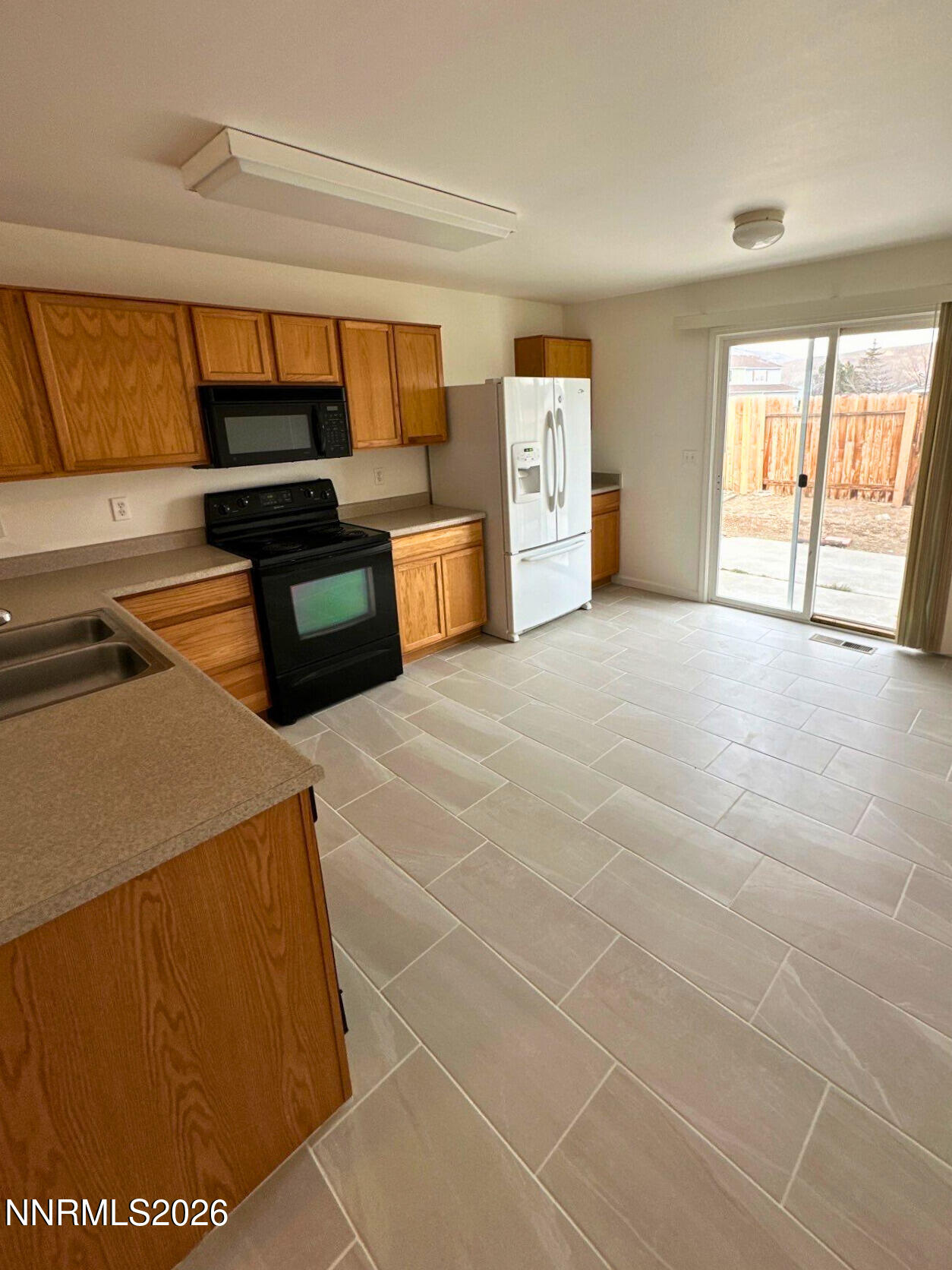 8675 Crimson Sky Court Reno, NV 89506 - Photo 5 of 16 a view of kitchen with furniture and cabinets