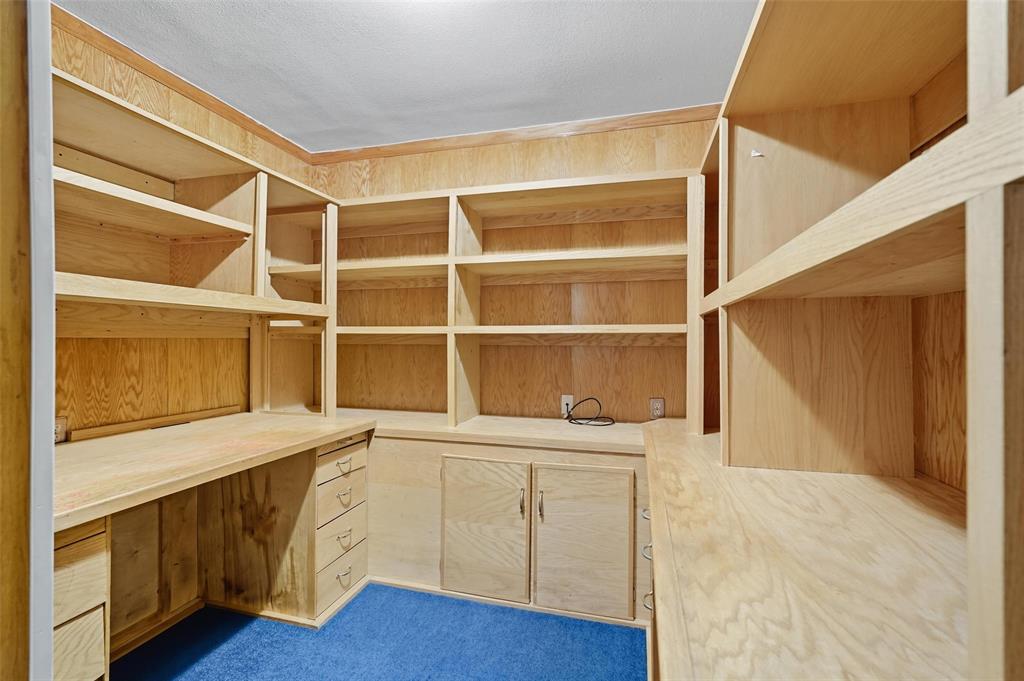 6108 Jennings Drive The Colony, TX 75056 - Photo 26 of 32 a view of an empty room with a window and wooden floor