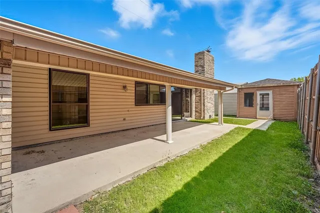 a view of backyard of house