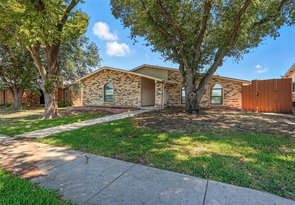 6108 Jennings Drive The Colony, TX 75056 - Photo 32 of 32 a view of a house with a yard