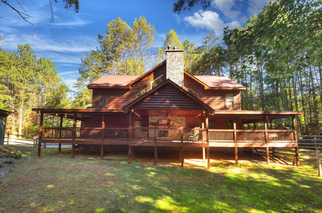 523 Long Branch Road Ranger, GA 30734 - Photo 17 of 56 a view of a house with a yard
