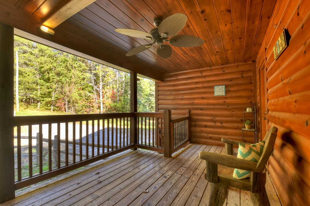 523 Long Branch Road Ranger, GA 30734 - Photo 22 of 56 a view of a porch with wooden floor and outdoor space