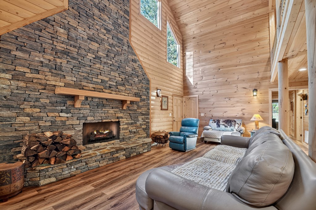 523 Long Branch Road Ranger, GA 30734 - Photo 25 of 56 a living room with furniture and a fireplace