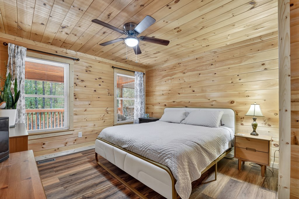 523 Long Branch Road Ranger, GA 30734 - Photo 34 of 56 a bedroom with a bed and a large window