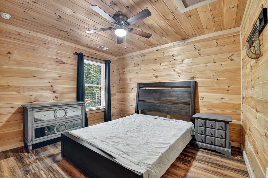 523 Long Branch Road Ranger, GA 30734 - Photo 42 of 56 a bed room with a bed and a dresser