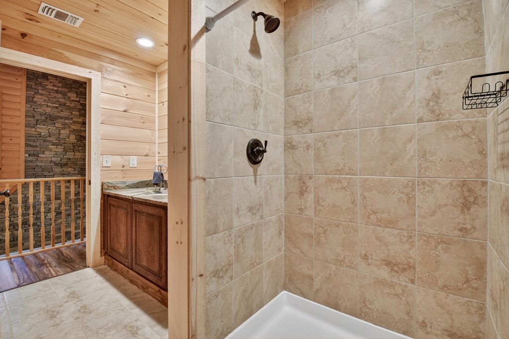 523 Long Branch Road Ranger, GA 30734 - Photo 46 of 56 a bathroom with a shower and a sink