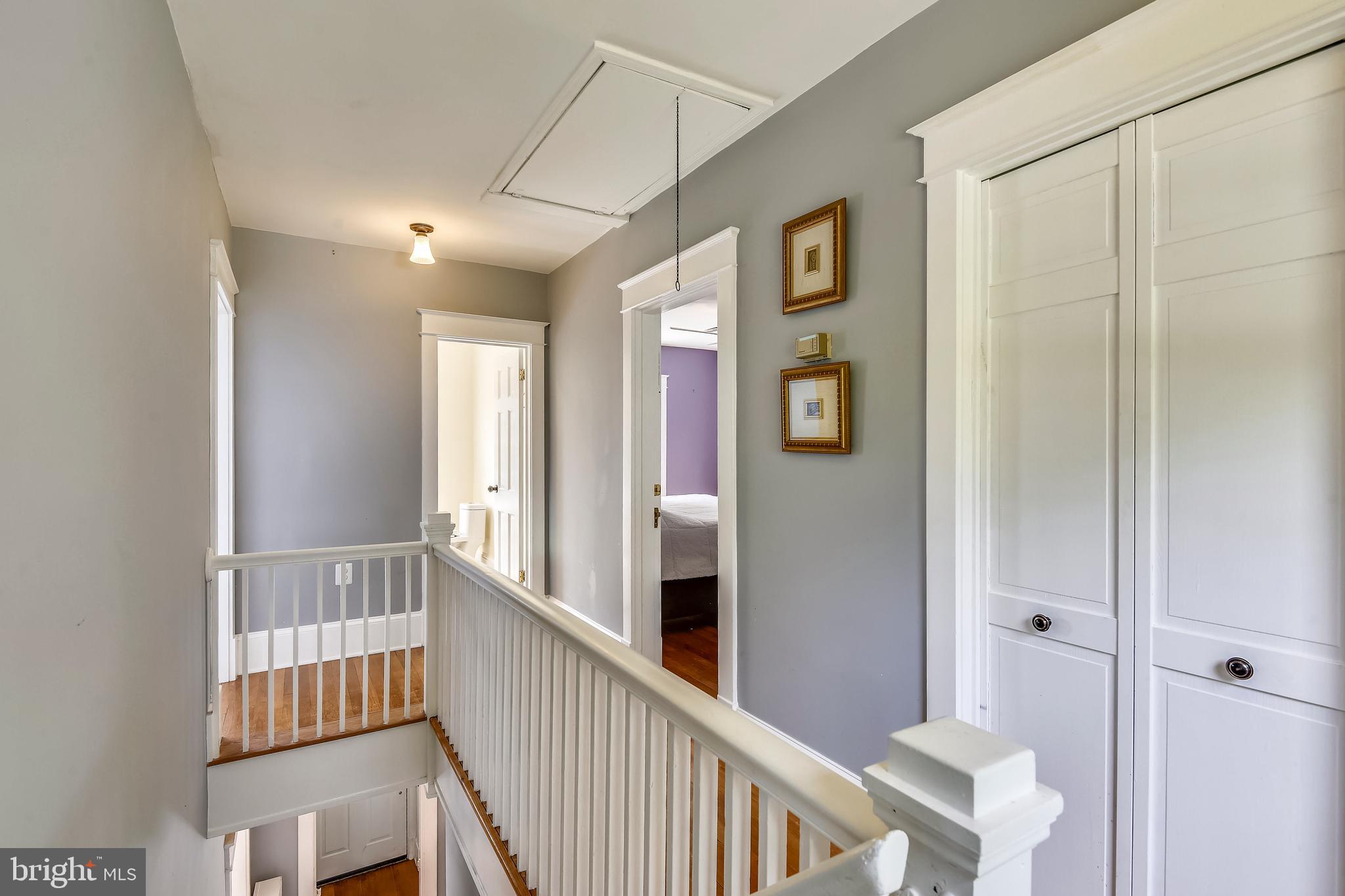 1407 North Glebe Road Arlington, VA 22207 - Photo 25 of 43 Upstairs Hallway doors on right contain washer & D
