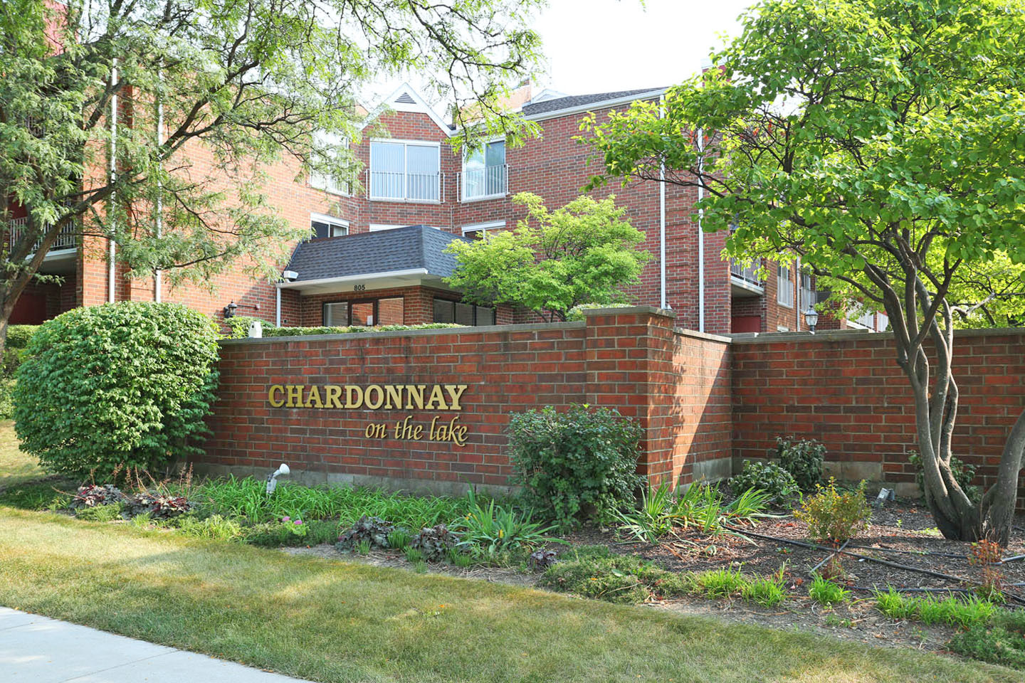 815 Leicester Road, Unit 108 Elk Grove Village, IL 60007 - Photo 4 of 34 a sign on the side of a building