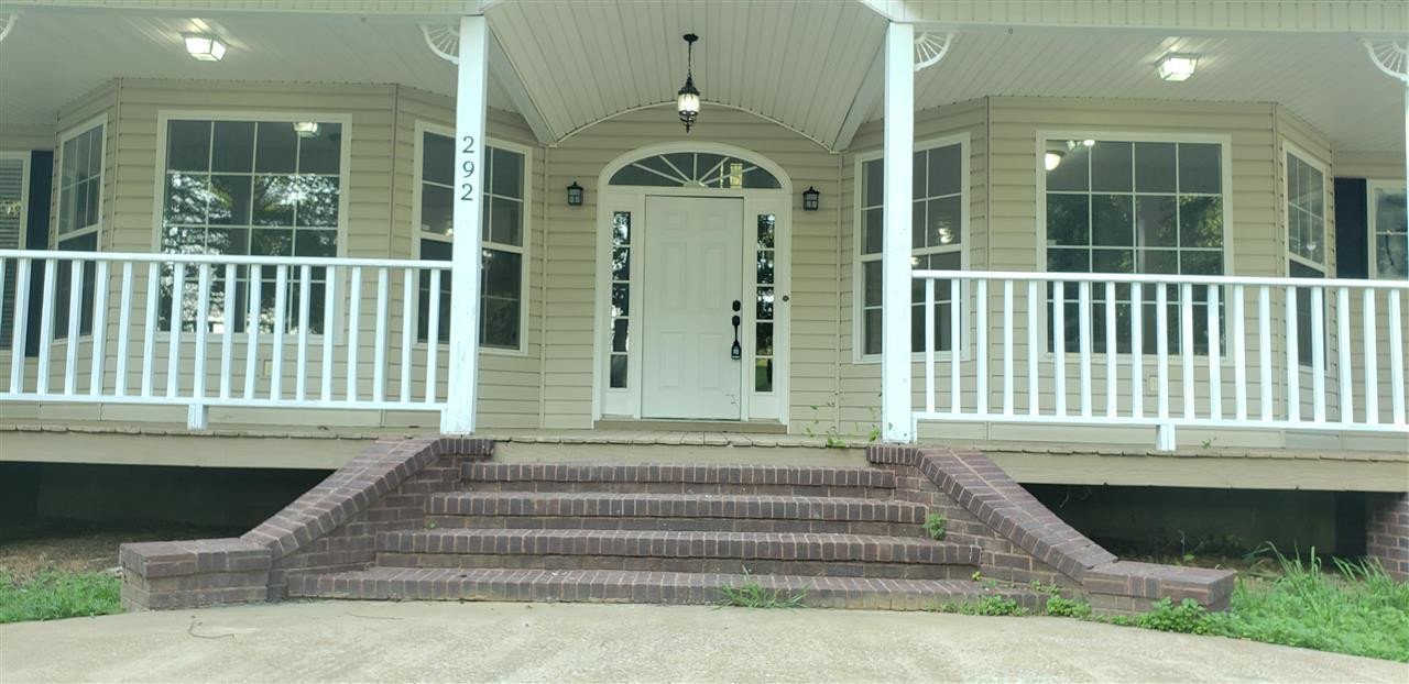 292 Gilbert Road Parsons, TN 38363 - Photo 4 of 16 a view of a entrance door of the house