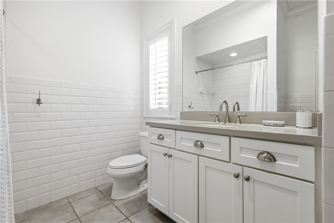 2116 Cavalla Road Vero Beach, FL 32963 - Photo 15 of 23 a bathroom with a sink a toilet and a mirror