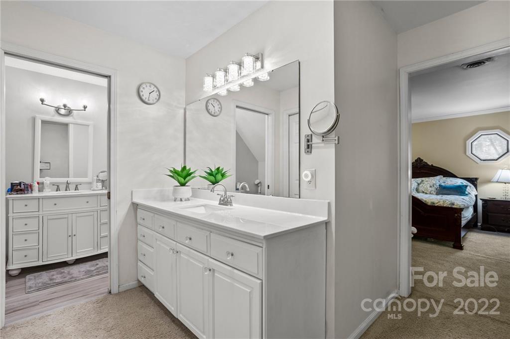 340 Regency Road Salisbury, NC 28147 - Photo 41 of 47 a bathroom with a sink and a mirror