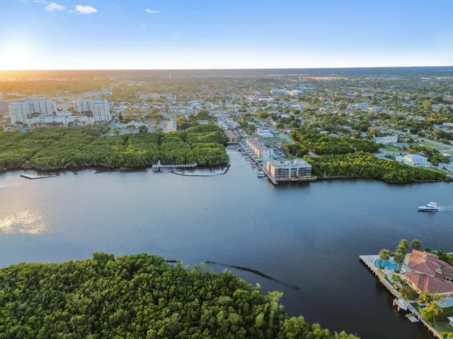 an aerial view of lake and city