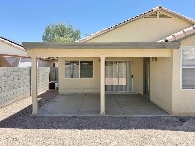 a front view of a house with a outdoor space