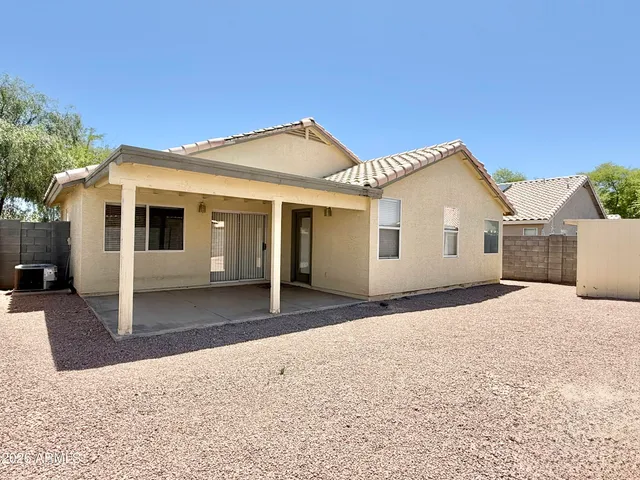 a view of a yard with palm tree
