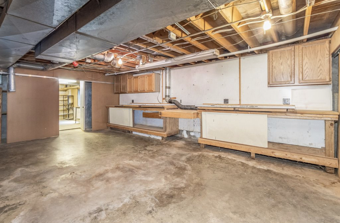1943 Church Road Aurora, IL 60505 - Photo 16 of 31 a view of a kitchen with stainless steel appliances granite countertop a sink and cabinets