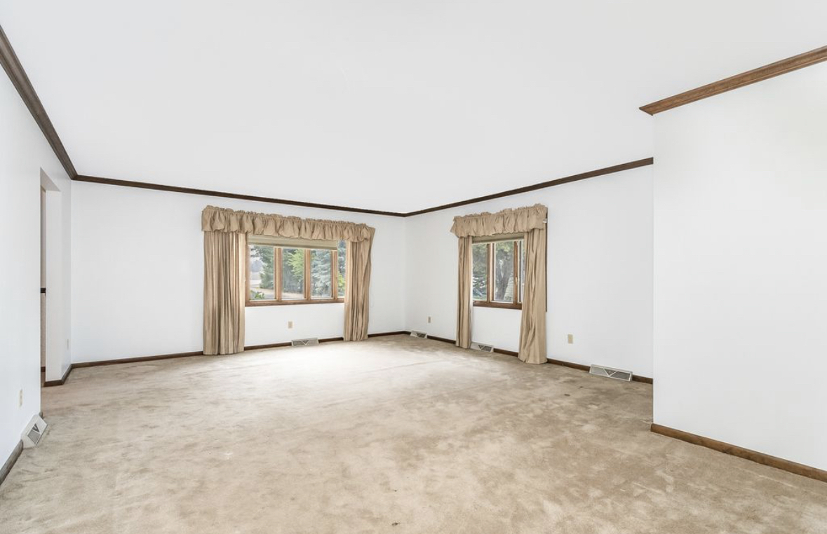 1943 Church Road Aurora, IL 60505 - Photo 2 of 31 an empty room with windows and closet