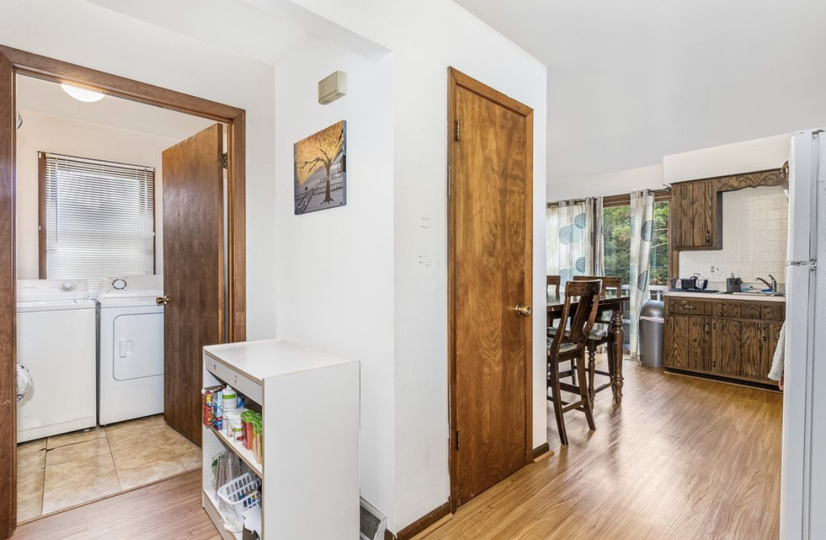 1943 Church Road Aurora, IL 60505 - Photo 23 of 31 a view of hallway with furniture and wooden floor