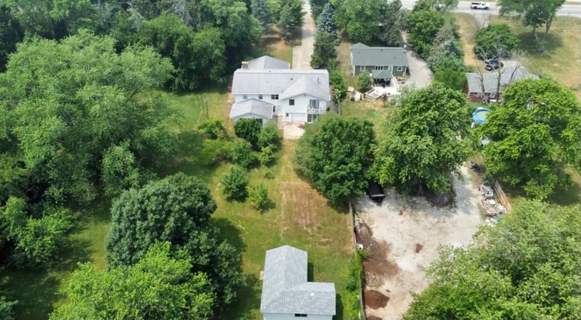 1943 Church Road Aurora, IL 60505 - Photo 27 of 31 an aerial view of a house with a yard basket ball court and outdoor seating