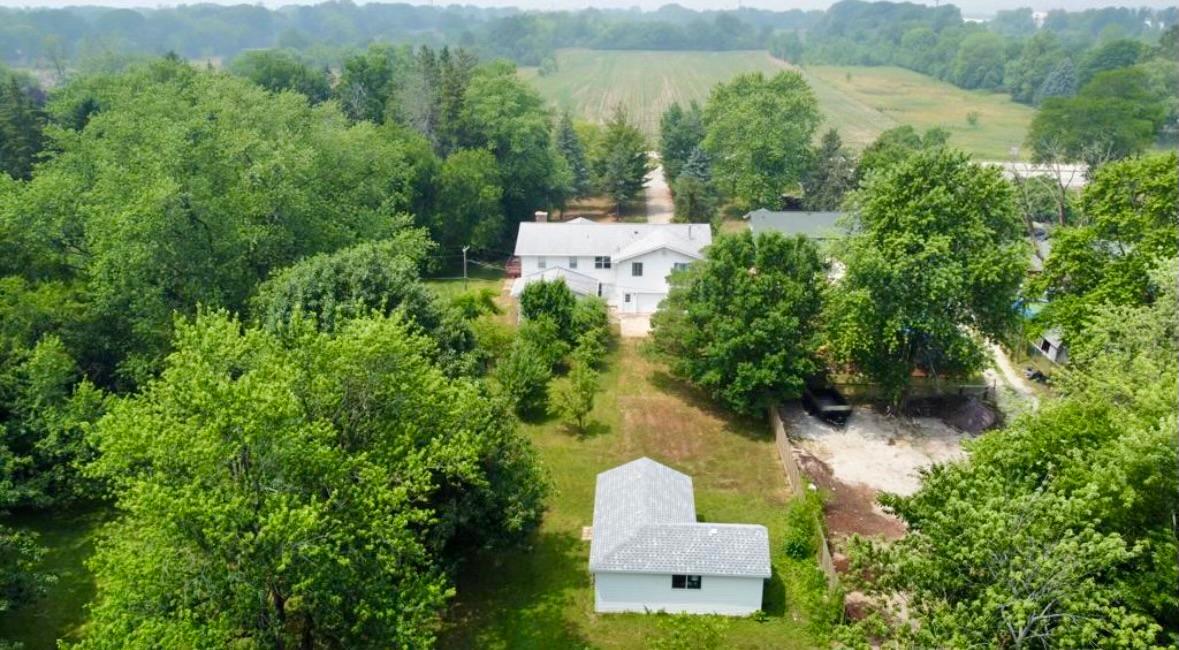 1943 Church Road Aurora, IL 60505 - Photo 28 of 31 a view of a lake with a mountain in the background