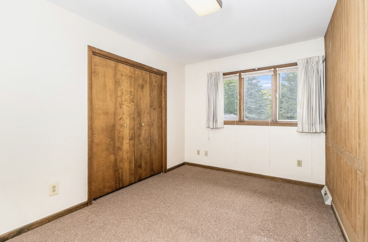 1943 Church Road Aurora, IL 60505 - Photo 10 of 31 an empty room with windows