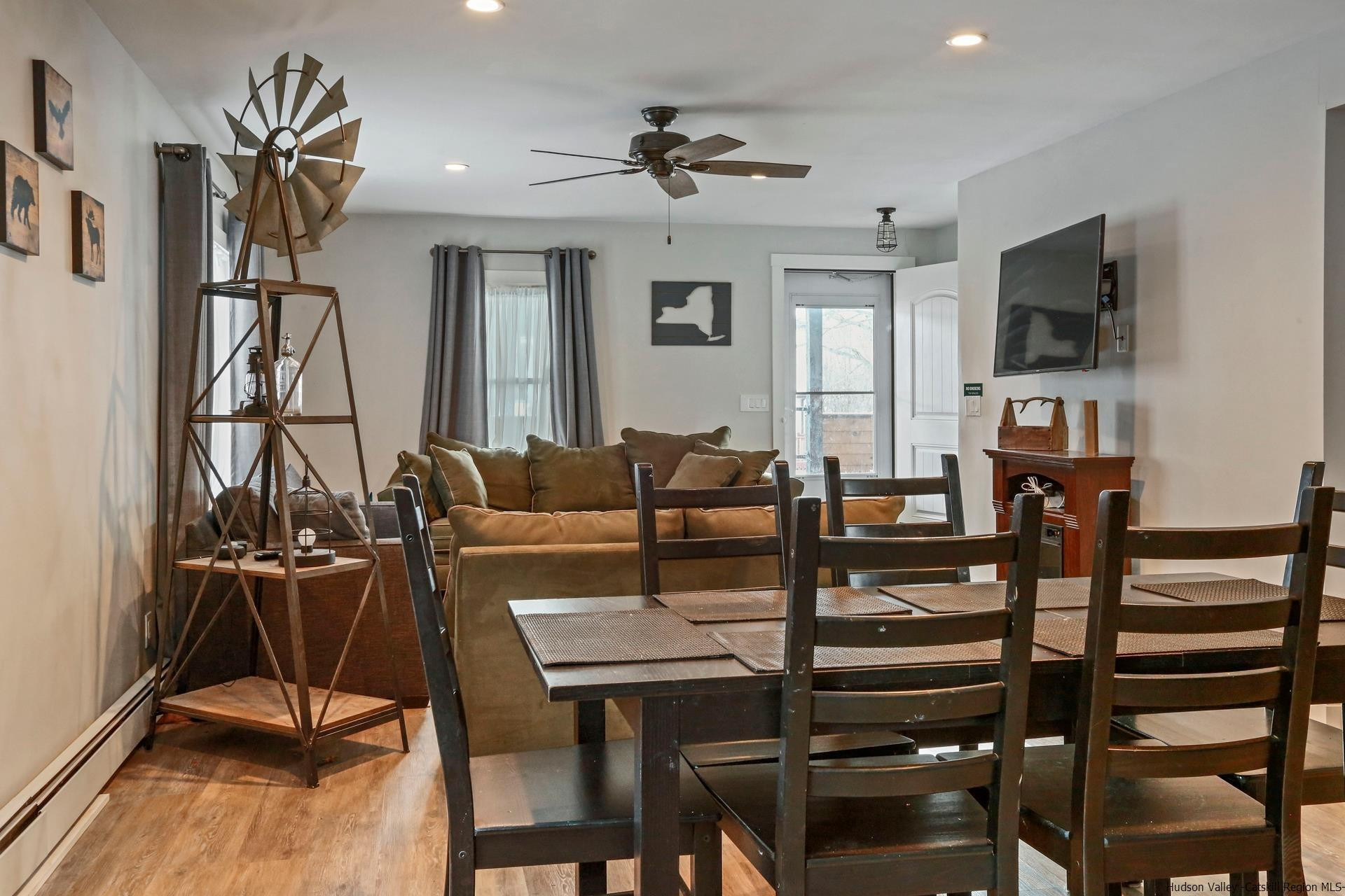 7732 Main Street Hunter, NY 12442 - Photo 10 of 25 a view of a livingroom with furniture and a flat screen tv