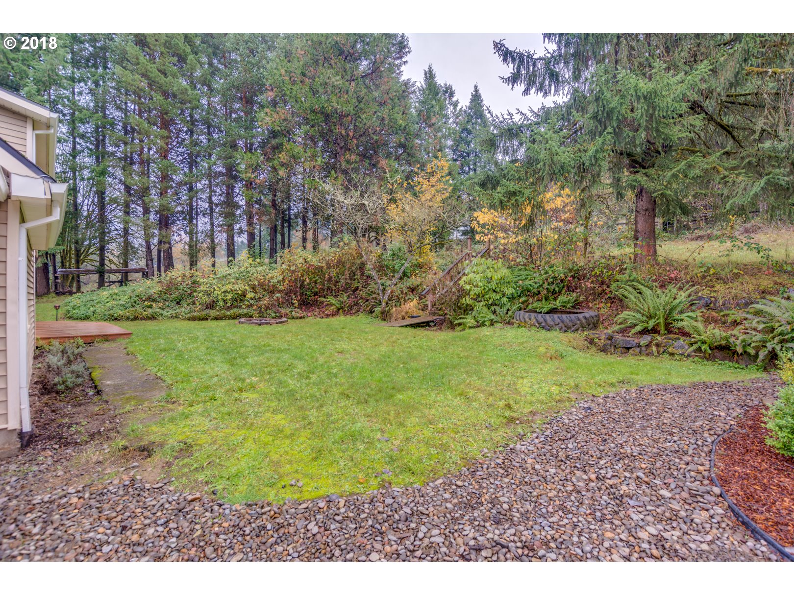 49572 Southwest South Road Gaston, OR 97119 - Photo 32 of 32 a view of a yard and front view of a house