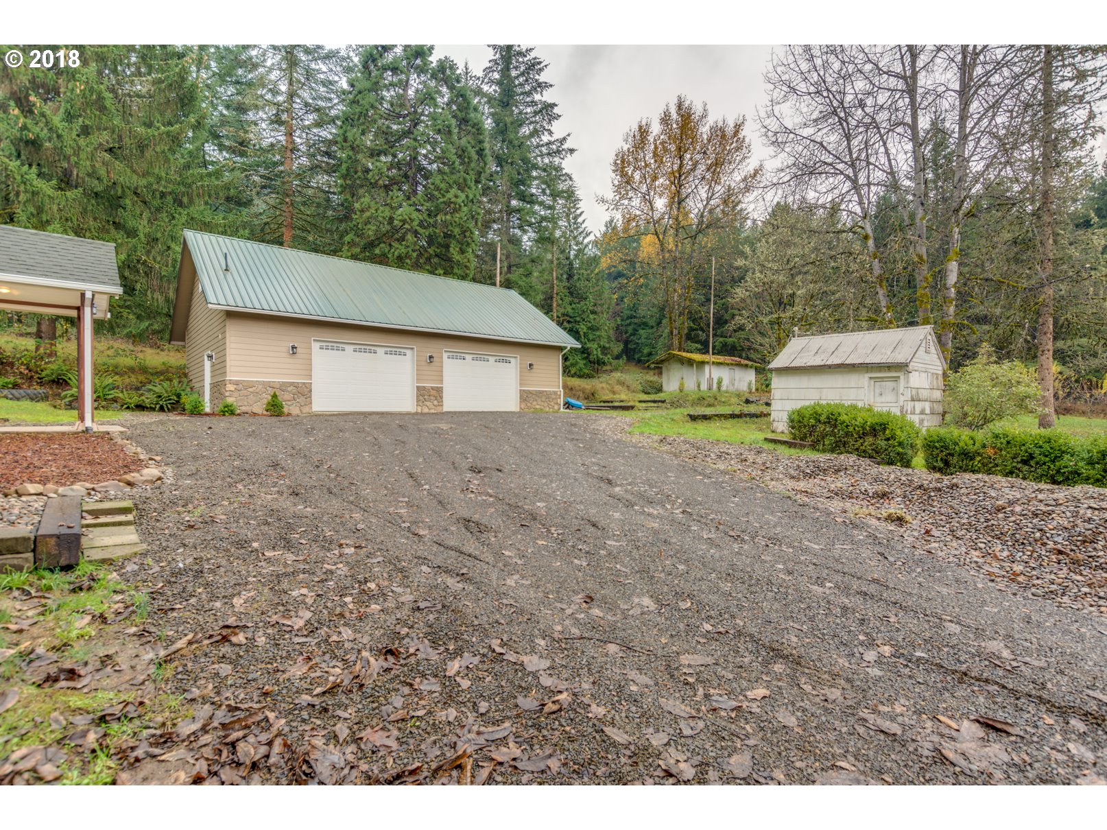 49572 Southwest South Road Gaston, OR 97119 - Photo 4 of 32 a view of a house with a yard and large tree