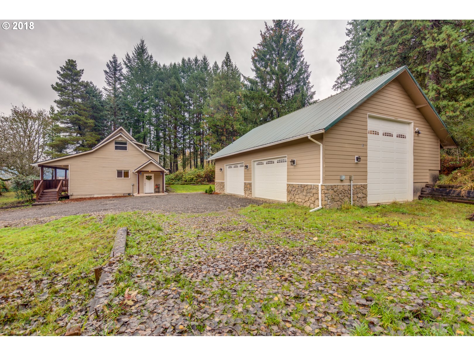 49572 Southwest South Road Gaston, OR 97119 - Photo 5 of 32 a view of a backyard with a garden