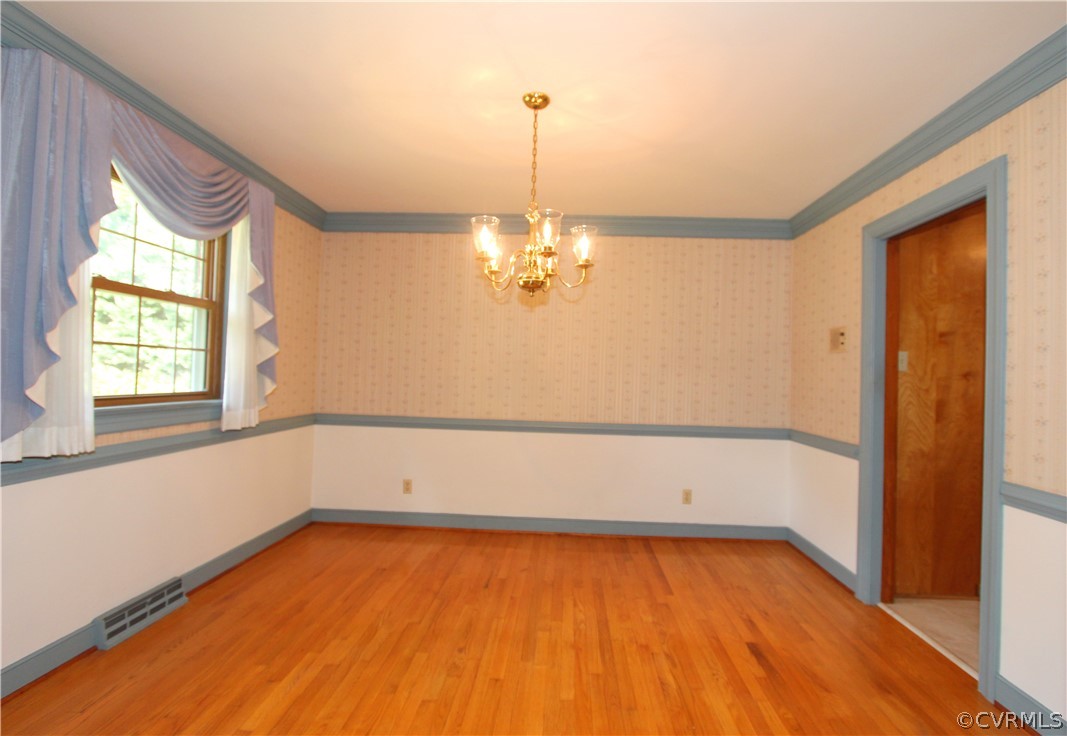 2529 Salisbury Road Midlothian, VA 23113 - Photo 5 of 20 a view of empty room with wooden floor and fan
