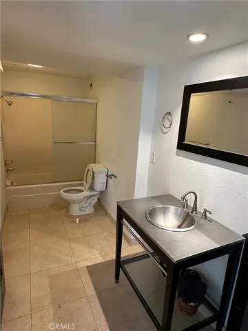 a view of balcony with furniture