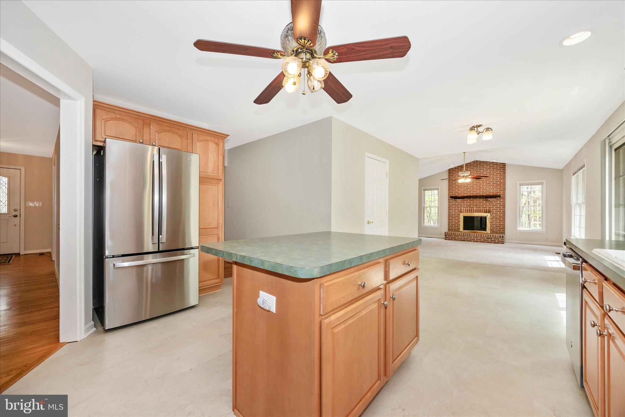 10393 Liberty Road Frederick, MD 21701 - Photo 23 of 47 a kitchen with stainless steel appliances granite countertop a stove and a refrigerator