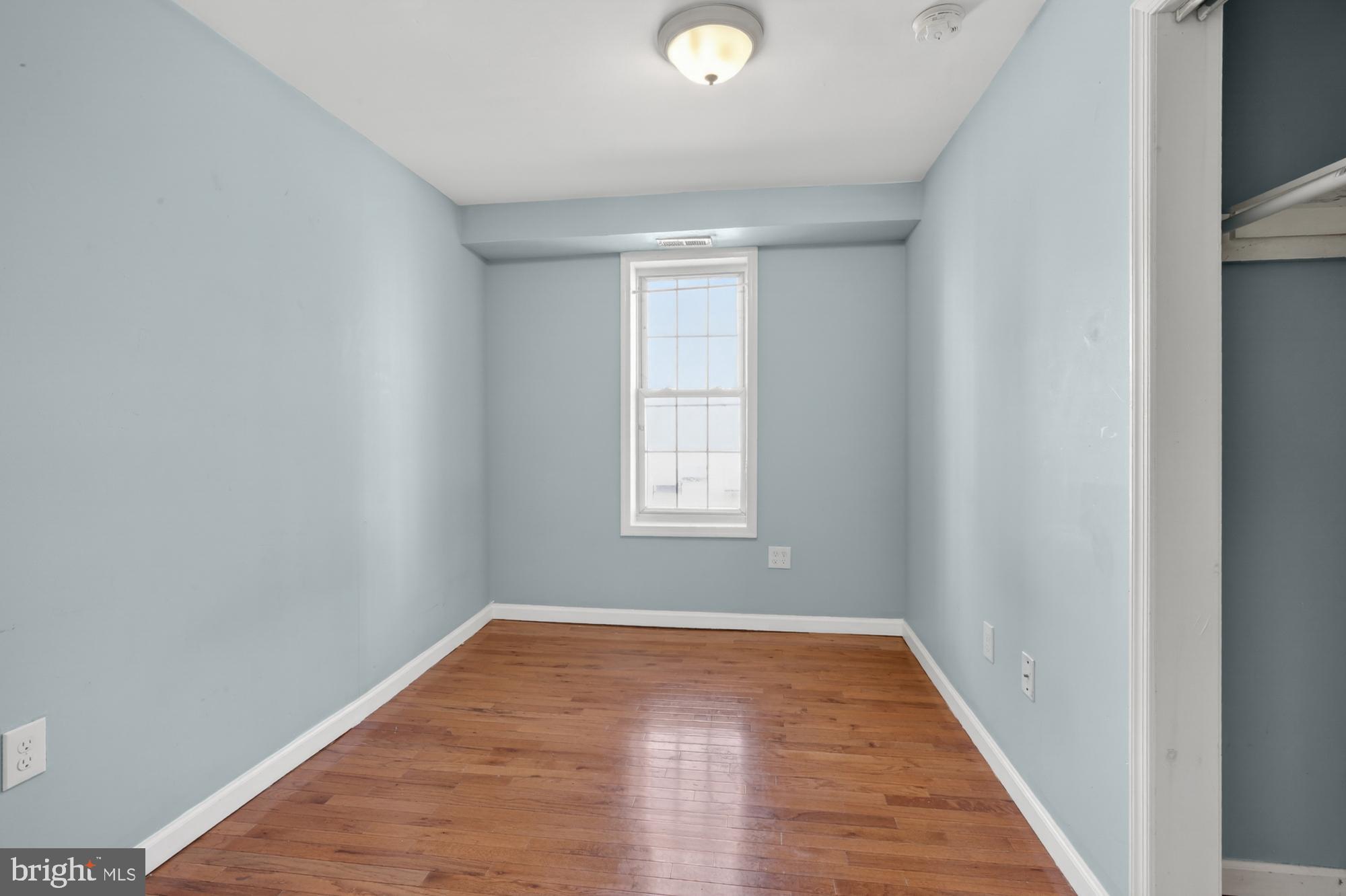 1400 South Chadwick Street, Unit 2 Philadelphia, PA 19146 - Photo 10 of 20 a view of empty room with wooden floor
