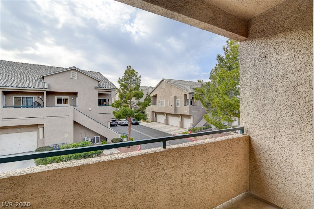2052 Quarry Ridge Street, Unit 201 Las Vegas, NV 89117 - Photo 22 of 25 A well-maintained community offers convenient garage access and open parking.