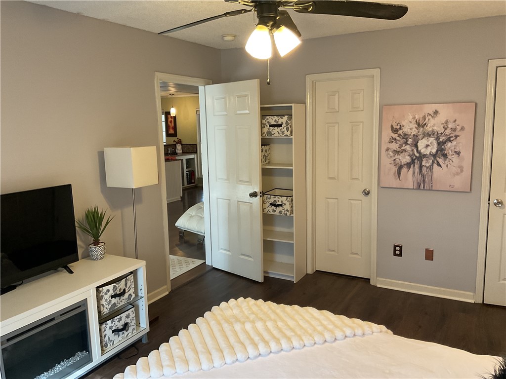 229 Cub Cove Drive Walhalla, SC 29691 - Photo 25 of 50 This cozy bedroom features a stylish ceiling fan, providing comfort and a pleasant ambiance.